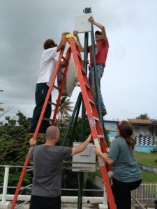 Tom Voorhees (top) WVQR Stub tower STL repeater dishes going up! Vieques in Puerto Rico, 2013.